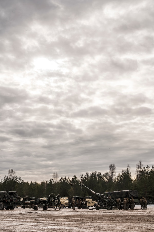 Marines with Hotel Battery, 3rd Battalion, 14th Marine Regiment, 4th Marine Division, prepare vehicles and equipment for a movement at Adazi Training Area, Latvia, Feb. 27, 2019, during exercise Dynamic Front 19. Exercise Dynamic Front 19 includes approximately 3,200 service members from 27 nations who are observing or participating from Grafenwoehr Training Area, Germany; Riga, Latvia; and Torun, Poland; during March 2-9, 2019. Dynamic Front is an annual U.S. Army Europe exercise focused on the readiness and interoperability of U.S. Army, joint service, and allied and partner nations’ artillery and fire support working together in a multinational environment. (U.S. Marine Corps photo by Cpl. Niles Lee)