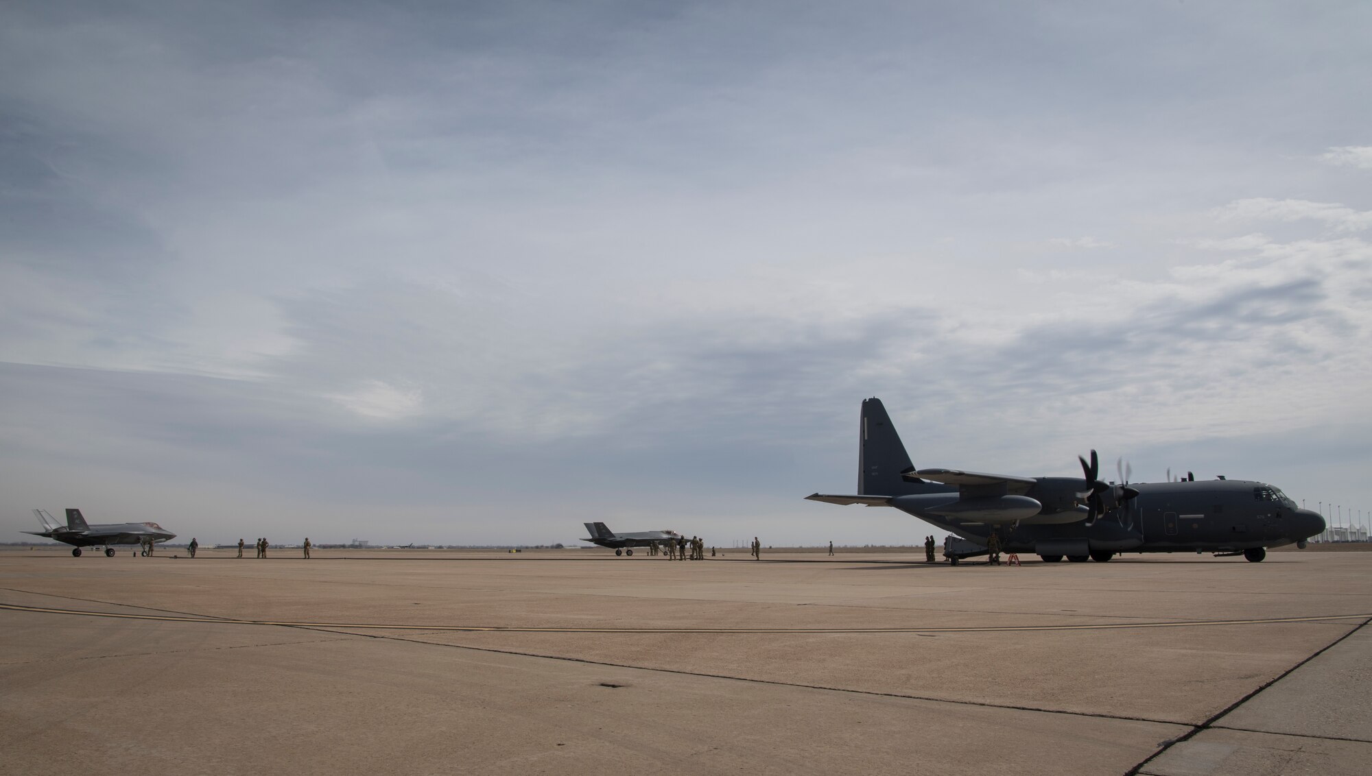 Airmen from the 388th Fighter Wing at Hill Air Force Base, Utah, and Air Commandos from the 26th Special Tactics Squadron and the 27th Special Operation Logistics Readiness Squadron conduct a forward area refueling point from an MC-130J Commando II to an F-35A Lightning II at Cannon AFB, N.M., Feb. 27, 2018.