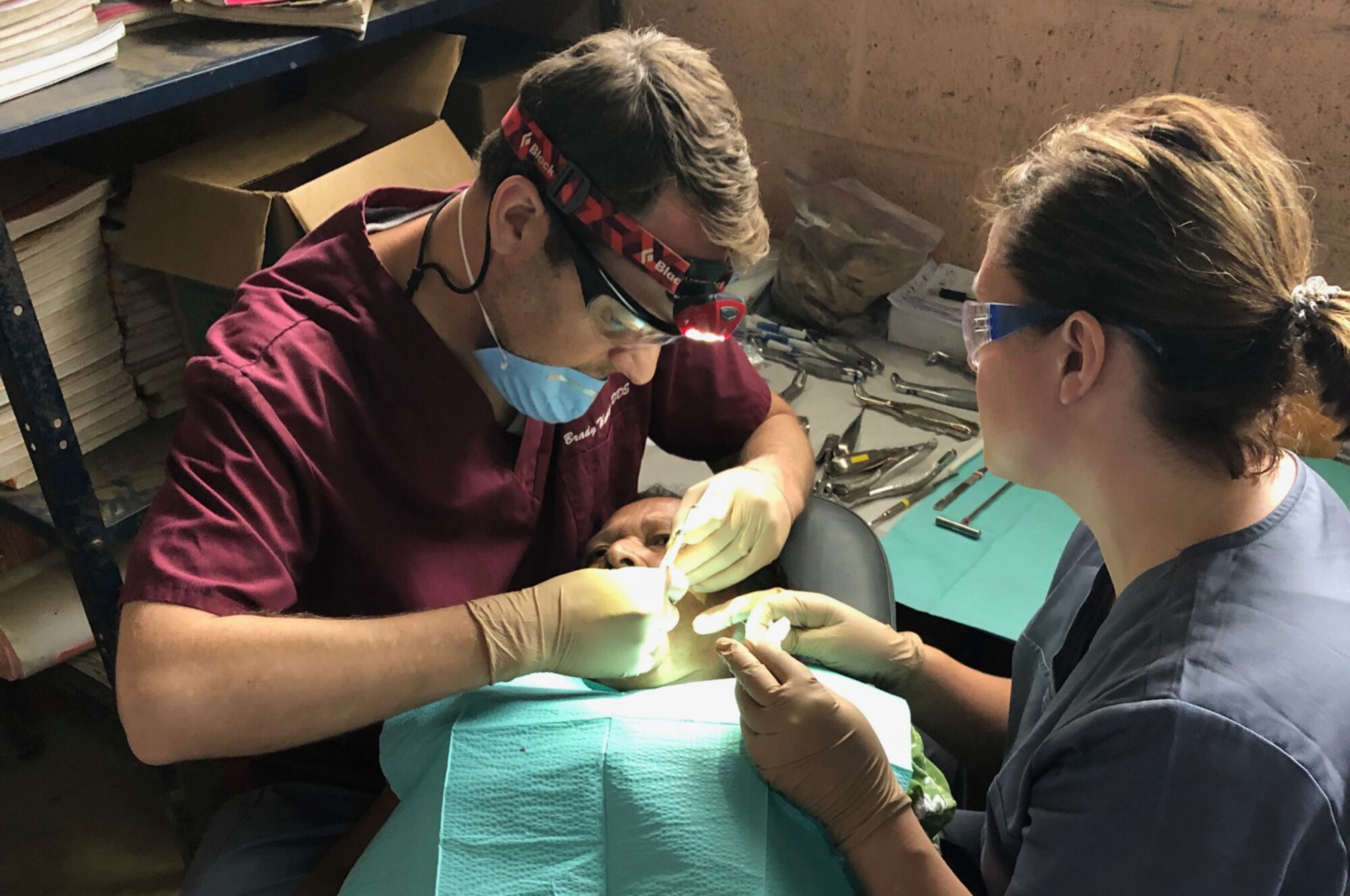 Lt. Col. Brady Thomson, a reservist in the 419th Medical Squadron, performs dental work on a Guatemalan resident during a recent humanitarian mission to Chiquimula.