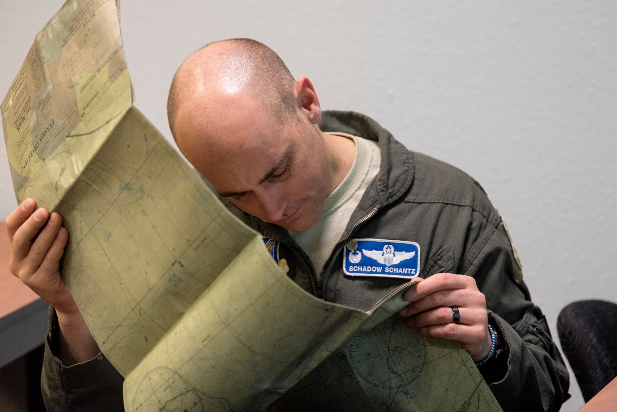 U.S. Air Force Lt. Col. Henry Schantz, 525th Fighter Squadron commander, observes an evasion chart during a Survival, Evasion, Resistance and Escape Combat Survival Training course at Joint Base Elmendorf-Richardson, Alaska, March, 7, 2019. Combat Survival Training is the SERE refresher course for high-risk personnel to get reacquainted with some of the skills they learned during the extensive S-V-80A course at Fairchild Air Force Base in Spokane, Washington.