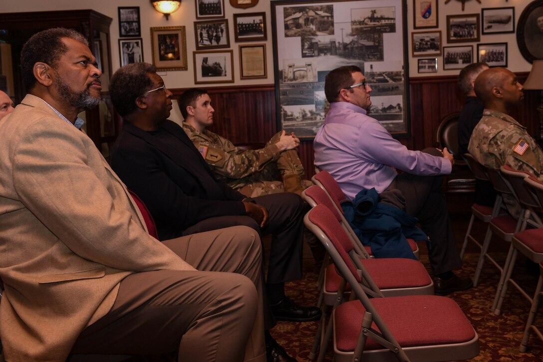U.S. Army Soldiers and civilian employees listen during a brown bag lunch series presentation at the U.S. Army Transportation Museum at Joint Base Langley-Eustis, Virginia, Feb. 13, 2019. The lunch series takes place every second Wednesday of the month at 11:30 a.m. in the Transportation Museum. (U.S. Air Force photo by Senior Airman Derek Seifert)
