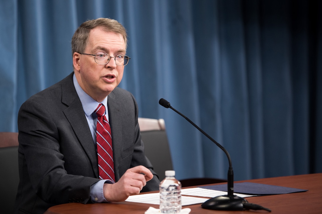 A Defense Department official briefs reporters at the Pentagon.