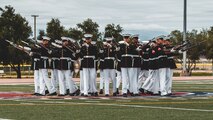 The U.S Marine Corps Silent Drill Platoon, Battle Colors Detachment, Marine Barracks Washington, D.C., performs during the Battle Colors ceremony at the Marine Corps Air Ground Combat Center, Twentynine Palms, Calif., March 11, 2019. The ceremony is held to honor Marine Corps traditions through the Drum Corps, the Silent Drill Platoon and the Battle Colors Detachment. (U.S. Marine Corps photo by Lance Cpl. Rachel K. Young-Porter)