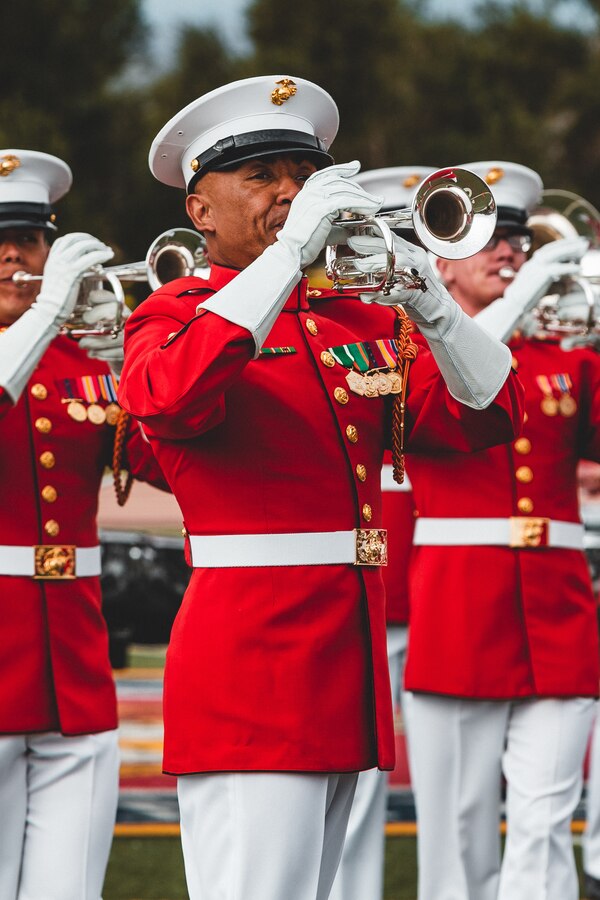 A U.S. Marine with "The Commandant's Own", The United States Marine Drum & Bugle Corps, Battle Colors Detachment, Marine Barracks Washington, D.C., performs during the Battle Colors ceremony at the Marine Corps Air Ground Combat Center, Twentynine Palms, Calif., March 11, 2019. The ceremony is held to honor Marine Corps traditions through the Drum Corps, the Silent Drill Platoon and the Battle Colors Detachment. (U.S. Marine Corps photo by Lance Cpl. Rachel K. Young-Porter)