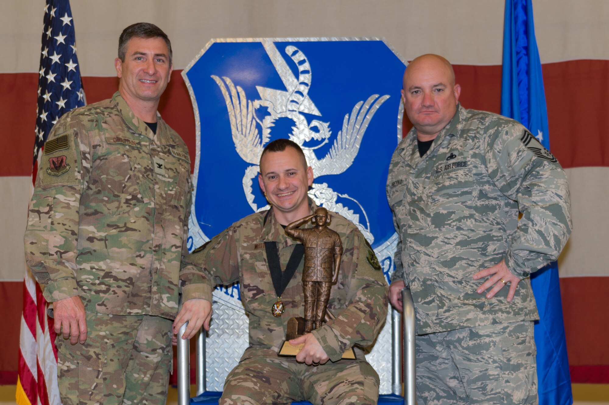 Master Sgt. Christopher West, 23d Aircraft Maintenance Squadron, wins the Lt. Gen. Leo Marquez Award, March 8, 2019, at Moody Air Force Base, Ga. West won this award for the NCO in Munitions and Missile category. Maintenance Professional of the Year (MPOY) is a long-running tradition in the maintenance career field. MPOY is a ceremony that highlights that year's top performing Airmen. (U.S. Air Force photo by Airman 1st Class Hayden Legg)