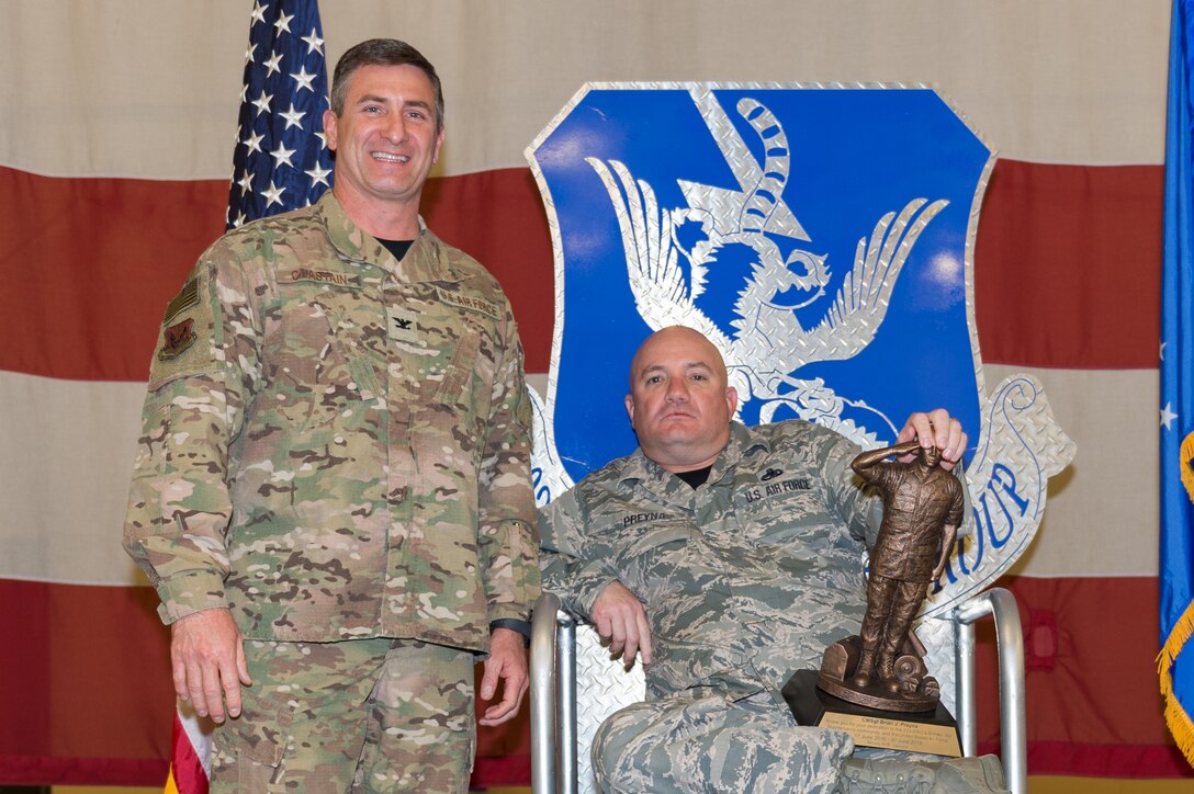 Chief Master Sgt. Brian Preyna, 23d Maintenance Group (MXG), wins an award for his contributions to the 23d MXG, March 8, 2019, at Moody Air Force Base, Ga. Maintenance Professional of the Year (MPOY) is a long-running tradition in the maintenance career field. MPOY is a ceremony that highlights that year's top performing Airmen. (U.S. Air Force photo by Airman 1st Class Hayden Legg)