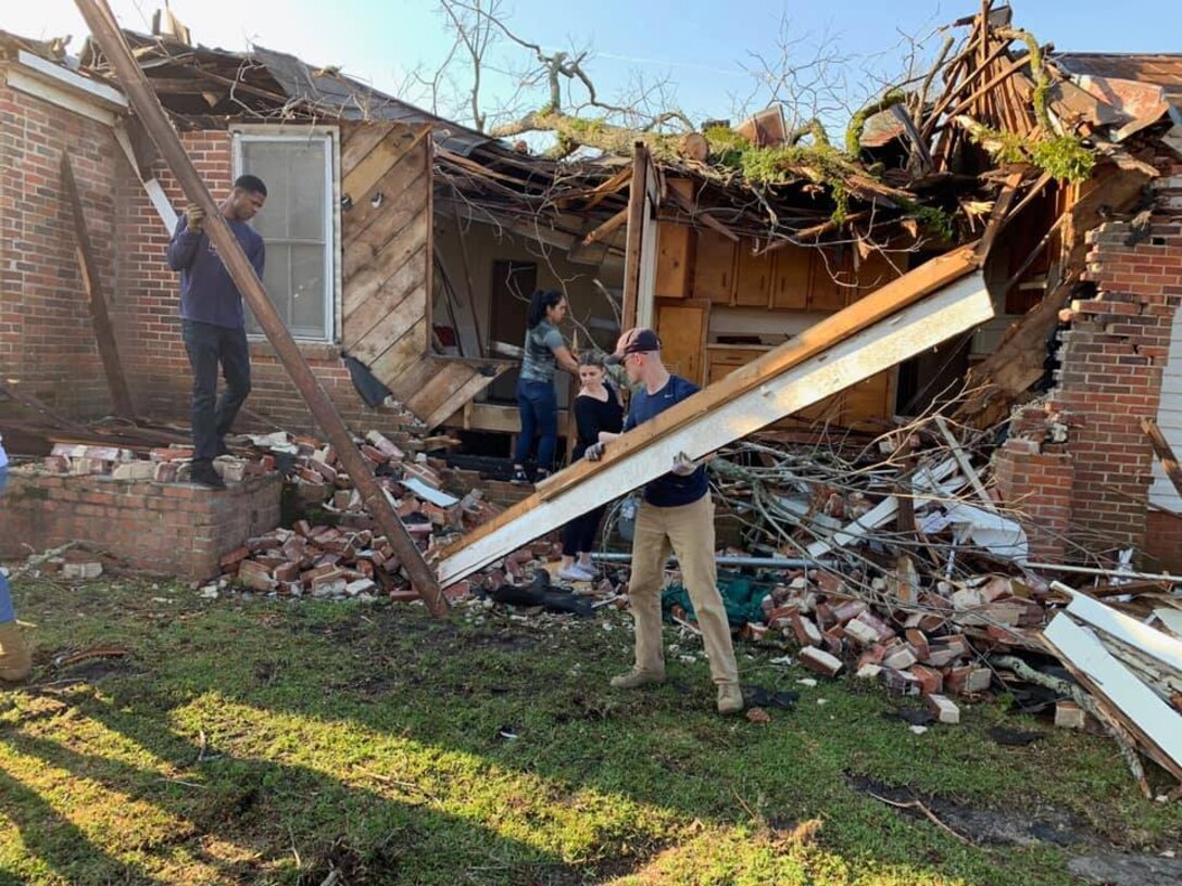 Dozens of Marines aboard Marine Corps Logistics Base Albany stepped up to lend a helping hand to the residents in Cairo, Ga, Mar. 12.