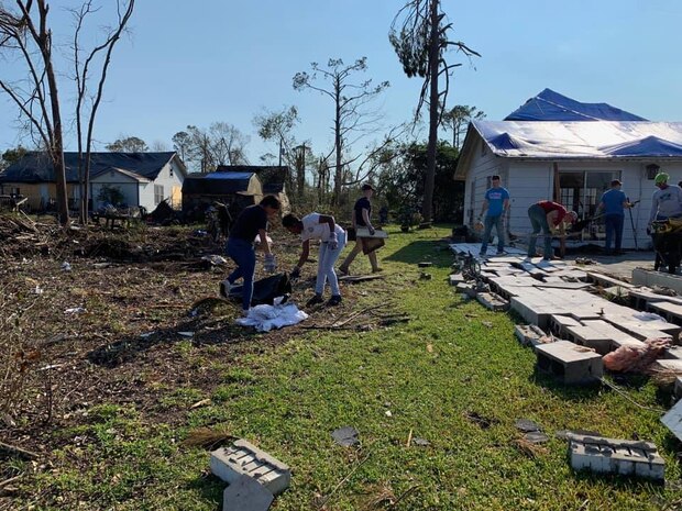 Dozens of Marines aboard Marine Corps Logistics Base Albany stepped up to lend a helping hand to the residents in Cairo, Ga, Mar. 12.