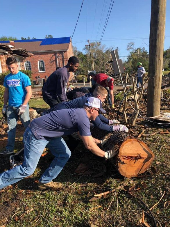 Dozens of Marines aboard Marine Corps Logistics Base Albany stepped up to lend a helping hand to the residents in Cairo, Ga, Mar. 12.