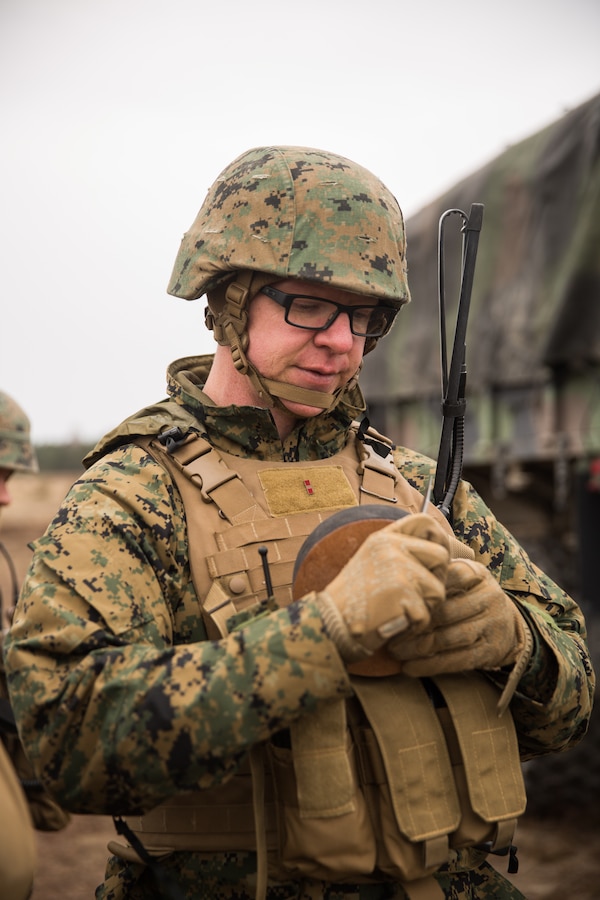 U.S. Marine Corps Warrant Officer Randall J. Walker, an explosive ordinance disposal officer attached to 14th Marine Regiment, 4th Marine Division, prepares foam for use in clearing a lodged round after a live-fire exercise at Adazi Training Area, Latvia, March 7, 2019, in support of exercise Dynamic Front 19. Exercise Dynamic Front 19 includes approximately 3,200 service members from 27 nations who are observing or participating from Grafenwoehr Training Area, Germany; Riga, Latvia; and Torun, Poland; during March 2-9, 2019. Dynamic Front is an annual U.S. Army Europe exercise focused on the readiness and interoperability of U.S. Army, joint service, and allied and partner nations’ artillery and fire support working together in a multinational environment. (U.S. Marine Corps photo by Lance Cpl. Faeth E. Webb)