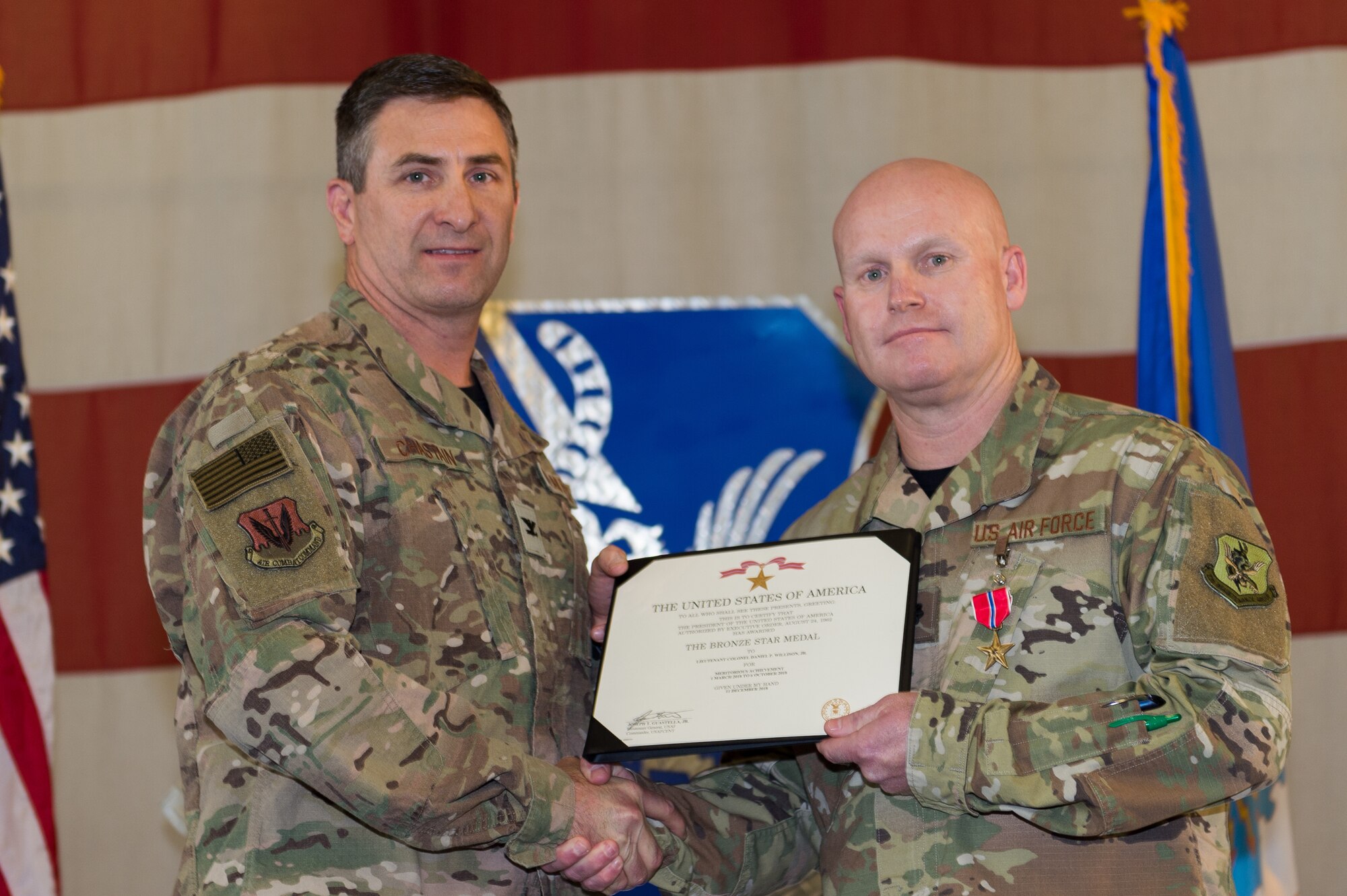 Lt. Col. Daniel Willison, 23d Maintenance Group, receives the Bronze Star, March 8, 2019, at Moody Air Force Base, Ga. Maintenance Professional of the Year (MPOY) is a long-running tradition in the maintenance career field. MPOY is a ceremony that highlights that year's top performing Airmen. (U.S. Air Force photo by Airman 1st Class Hayden Legg)