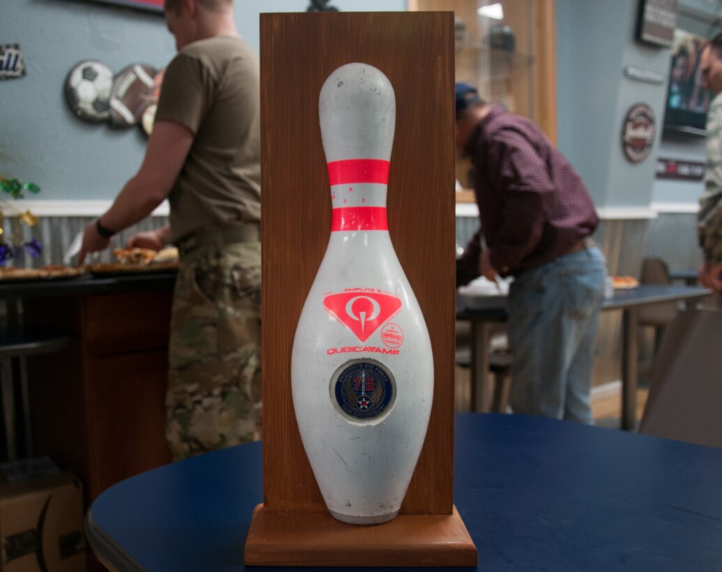 The 20th Air Force bowling tournament trophy is displayed at the F. E. Warren bowling alley on F. E. Warren AFB, Wyo., March 8, 2019. 20th Air Force headquarters staff organized a bowling tournament in honor of the 75th anniversary of 20th Air Force. (U.S. Air Force photo by 1st Lt Ieva Bytautaite)