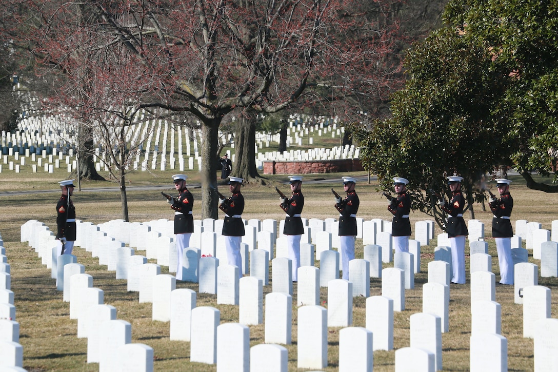 A firing party with Marine Barracks Washington D.C. renders a three-volley salute during a full honors funeral for Lt. Gen. Leo Dulacki at Arlington National Cemetery, Arlington, Virginia, March 13, 2019. Dulacki enlisted in the Marine Corps in 1941 and received his commission as a second lieutenant on Sept. 2, 1941. During his 32 years of service, Dulacki fought in World War II, Korea and Vietnam; he retired in January 1974. His personal decorations included the Distinguished Service Medal with a gold star, Legion of Merit with a combat distinguishing device for valor with three gold stars, and the Purple Heart. Dulacki passed away on Jan. 4, 2019 six days after his 100th birthday. (U.S. Marine Corps photo by Sgt. Robert Knapp/Released)