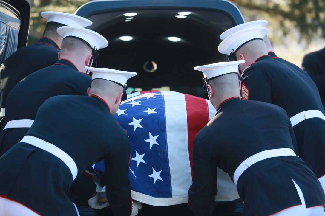Marine Corps Body Bearers, Bravo Company, Marine Barracks Washington D.C., unload the casket of Lt. Gen. Leo Dulacki during a full honors funeral for Dulacki at Arlington National Cemetery, Arlington, Virginia, March 13, 2019. Dulacki enlisted in the Marine Corps in 1941 and received his commission as a second lieutenant on Sept. 2, 1941. During his 32 years of service, Dulacki fought in World War II, Korea and Vietnam; he retired in January 1974. His personal decorations included the Distinguished Service Medal with a gold star, Legion of Merit with a combat distinguishing device for valor with three gold stars, and the Purple Heart. Dulacki passed away on Jan. 4, 2019 six days after his 100th birthday. (U.S. Marine Corps photo by Sgt. Robert Knapp/Released)
