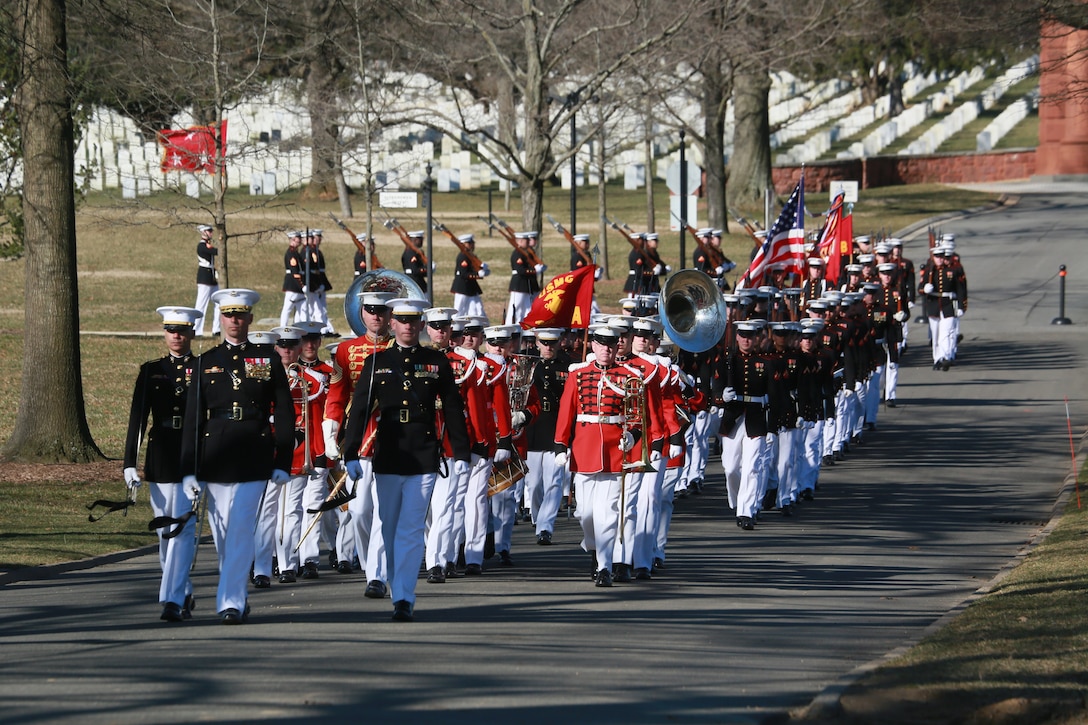 Marines with Marine Barracks Washington D.C. march in formation during a full honors funeral for Lt. Gen. Leo Dulacki at Arlington National Cemetery, Arlington, Virginia, March 13, 2019. Dulacki enlisted in the Marine Corps in 1941 and received his commission as a second lieutenant on Sept. 2, 1941. During his 32 years of service, Dulacki fought in World War II, Korea and Vietnam; he retired in January 1974. His personal decorations included the Distinguished Service Medal with a gold star, Legion of Merit with a combat distinguishing device for valor with three gold stars, and the Purple Heart. Dulacki passed away on Jan. 4, 2019 six days after his 100th birthday. (U.S. Marine Corps photo by Sgt. Robert Knapp/Released)