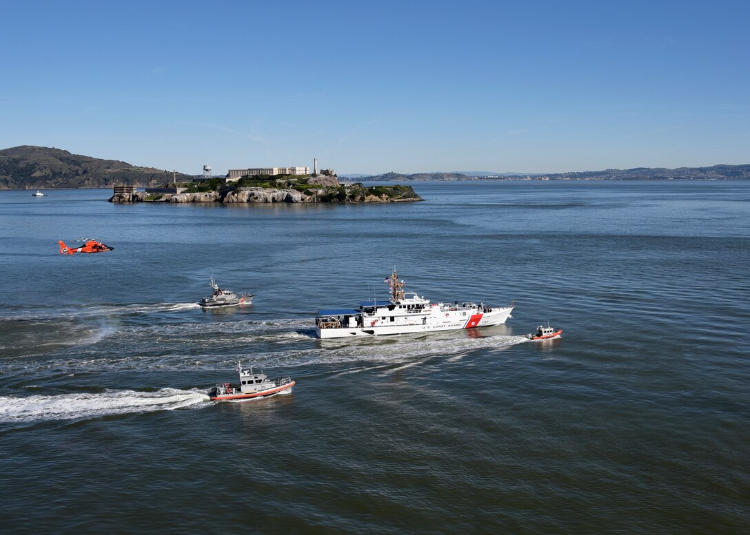 The Coast Guard Cutter Robert Ward, a Sentinel Class Fast Response Cutter (FRC) homeported at Coast Guard Base Los Angeles-Long Beach, is escorted by Coast Guard assets as the crew journeys to Coast Guard Sector San Francisco for a ceremonial commissioning, Feb. 22, 2019.