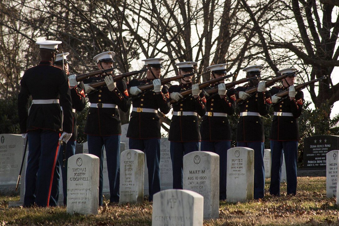 A firing party with Marine Barracks Washington D.C. renders a three-volley salute during a full honors funeral for Lt. Gen. John I. Hudson at Arlington National Cemetery, Arlington, Virginia, Feb. 26, 2019. Lt. Gen. Hudson enlisted in the Navy on July 23, 1952 and was commissioned as a second lieutenant in the Marine Corps and designated as a Naval Aviator on June 11, 1954. During his 37-year career, Hudson held various commands; his final assignment was Deputy Commandant for Manpower. At the time of his retirement in 1989, Hudson was the active duty Marine Aviator holding the earliest designation date. Hudson's personal decorations included the Distinguished Service Medal, Distinguished Flying Cross, Bronze Star with combat distinguishing device, and 24 Air Medals. (Official U.S. Marine Corps photo by Cpl. Damon McLean/Released)