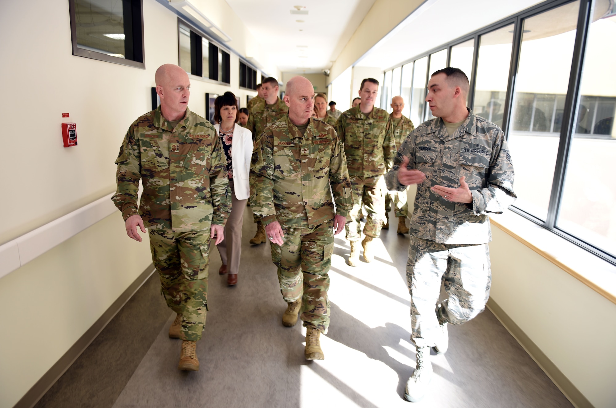 U.S. Air Force Maj. Gen. Sam Barrett, 18th Air Force commander, center, along with U.S. Air Force Chief Master Sgt. Chris Simpson, 18th Air Force command chief, left, tour David Grant USAF Medical Center at Travis Air Force Base, California, March 7, 2019. Barrett, along with his wife, Kelly, toured the base March 4 to 8 as part of a scheduled visit. (U.S. Air Force photo by Airman 1st Class Christian Conrad)