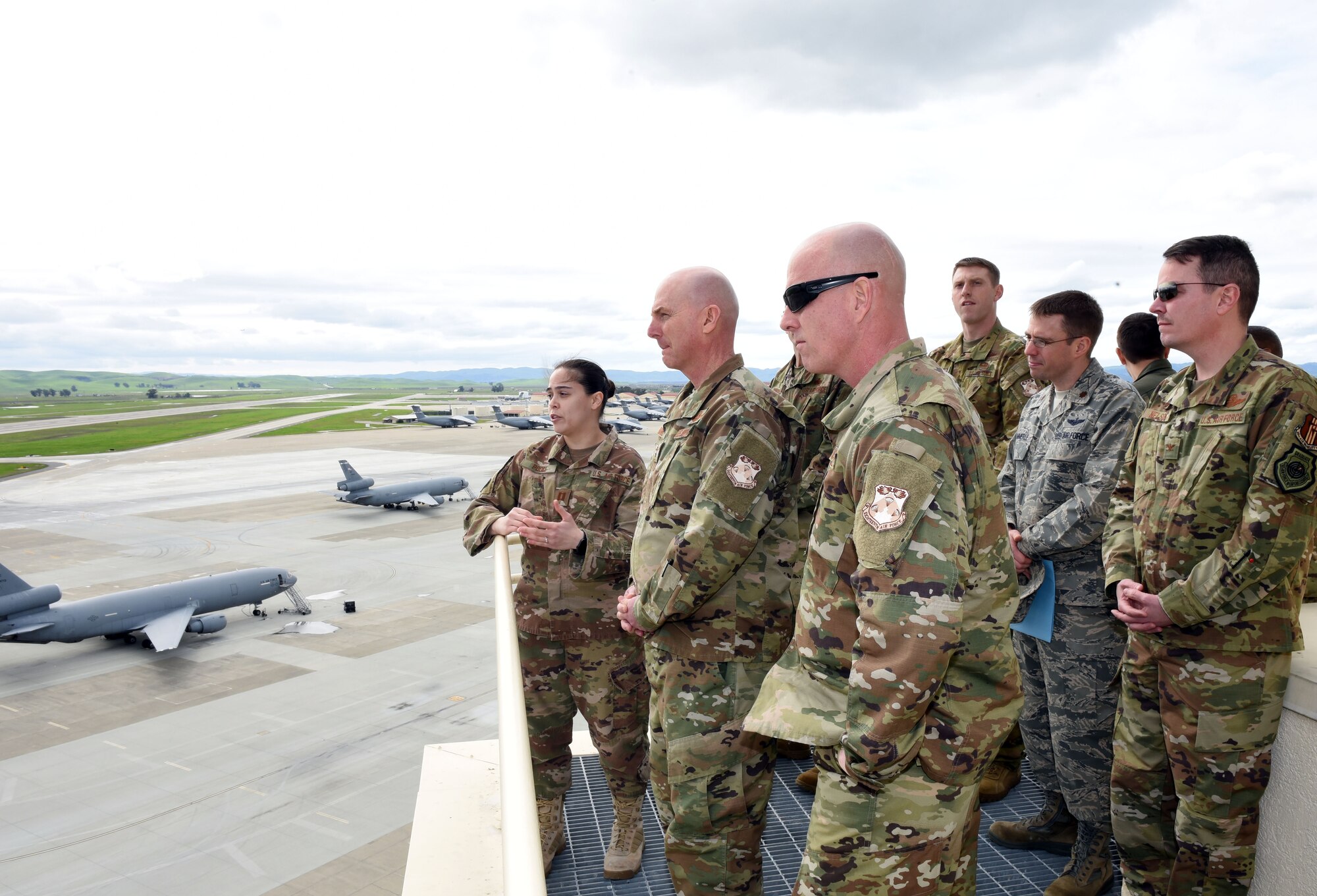 U.S. Air Force Maj. Gen. Sam Barrett, 18th Air Force commander, and U.S. Air Force Chief Master Sgt. Chris Simpson, 18th Air Force command chief, tour the air traffic control tower at Travis Air Force Base, California, March 7, 2019. Barrett and Simpson toured the base March 4 to 8 as part of a scheduled visit. (U.S. Air Force photo by Airman 1st Class Christian Conrad)