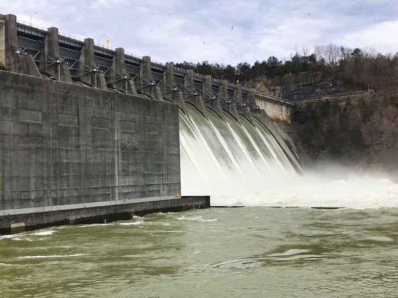 Wolf Creek Dam discharges water from the dam in Jamestown, Ky. March 13, 2019. Water managers are reducing discharges from 52,000 to 43,000 cubic feet per second by the afternoon. (USACE photo by Misty Cravens)