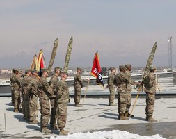 Soldiers of the 1st Infantry Division Sustainment Brigade stand during in their transfer of authority ceremony, at Bagram Air Field, Afghanistan, Feb 26, 2019.