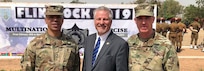 Brig. Gen. Aaron Dean, adjutant general, D.C. National Guard, U.S. Ambassador to Burkina Faso, Andrew Young and Brig. Gen. Robert Ryan, commanding general, Land Component Command attend    Flintlock 2019, a annual special operations and State Department exercise involving more than 2,000 soldiers, airmen, naval and police forces from 30 nation forces. Lessons learned at Flintlock strengthen global security institutions, promote multinational sharing of information, and develop interoperability among western and partner nations in North and West Africa.