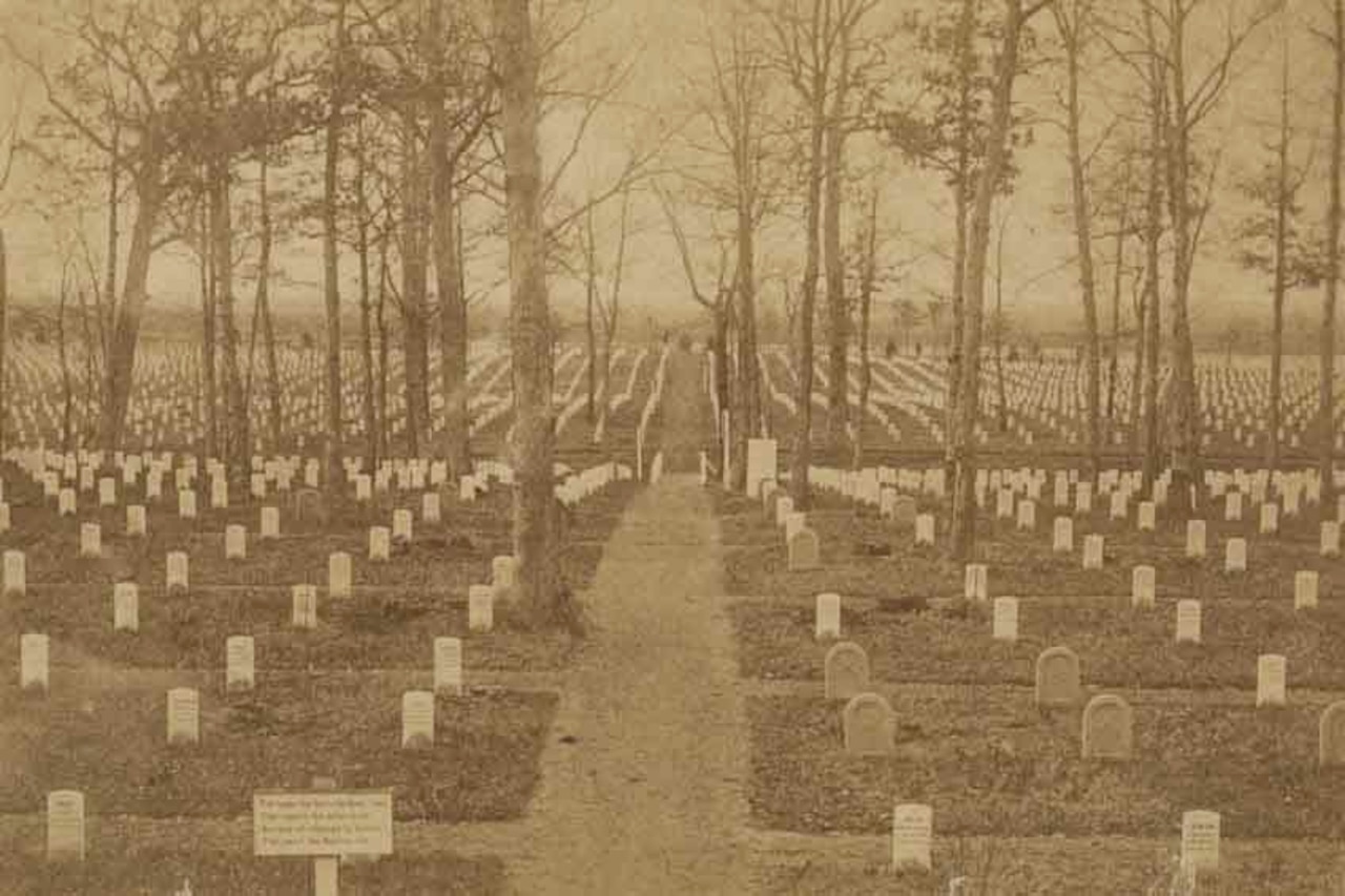 Historic image of rows of tombstones at Arlington National Cemetery.