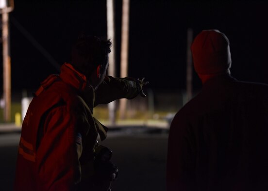 A member of the 30th Civil Engineer Squadron fire department shows Jim Lewis, 30th Space Wing Safety Office safety and health specialist of pad and missile, the launch facility after launch Feb. 5, 2019 at Vandenberg Air Force Base, Calif. Lewis’s job requires him to follow the first responders to the launch and to give back the keys of the facility. (U.S. Air Force photo by Airman 1st Class Aubree Milks)