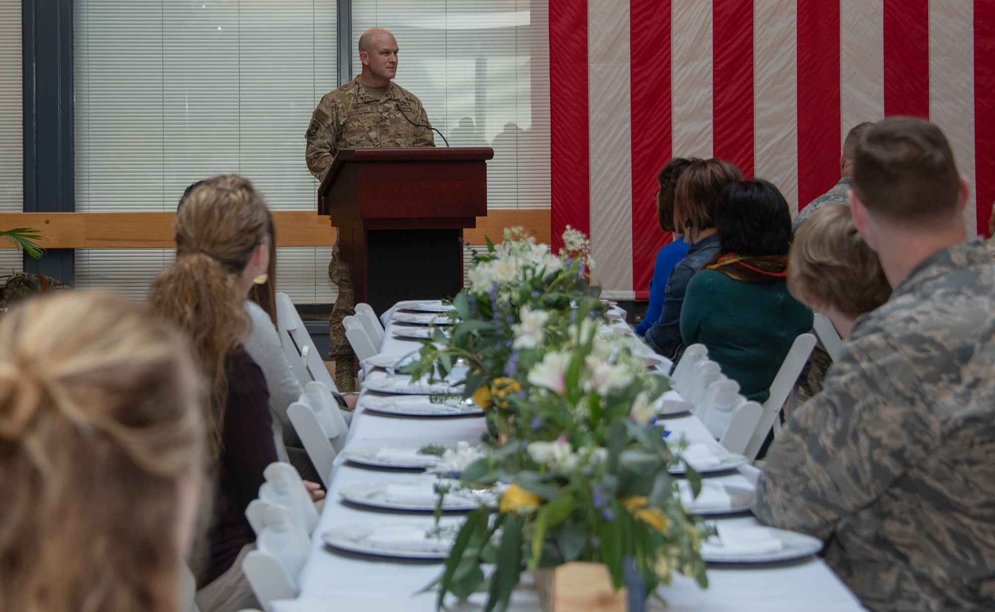 U.S. Air Force Col. David Hammerschmidt, 60th Aircraft Maintenance Group commander, delivers the opening remarks during the Key Spouse Recognition event at the 60th MXG atrium, Feb. 8, 2019 at Travis Air Force Base, California. The Key Spouse Program is an Air Force-wide volunteer program that builds and fosters support for military families through outreach education events and providing families a link to leadership.(U.S. Air Force photo by Heide Couch)