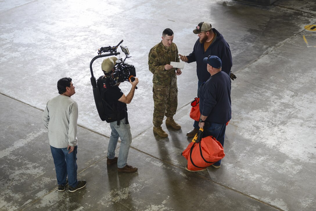 Members of the Profession of Arms Center of Excellence film inside of the 58th Special Operations Wing at Kirtland Air Force Base, N.M., March 6, 2019. Members of PACE spent two days filming Team Kirtland for part of their Heritage Today Program videos. (U.S. Air Force photo by Staff Sgt. Kimberly Nagle)