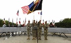 The 75th Ranger Regiment Color Guard posts the colors during the Pointe du Hoc Ranger Monument commemoration ceremony