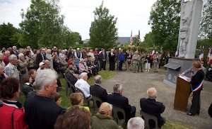 The Mayor of Amfreville reads a speech in Amfreville, France