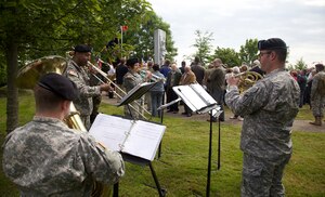 The U.S. Army Europe Band and Chorus plays at a ceremony in Amfreville, France