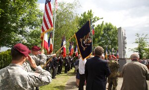 82nd Airborne Division Soldiers, French WWII veterans and civilians at a ceremony in Amfreville, France