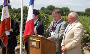 French Dignitaries speak at a ceremony in Amfreville, France