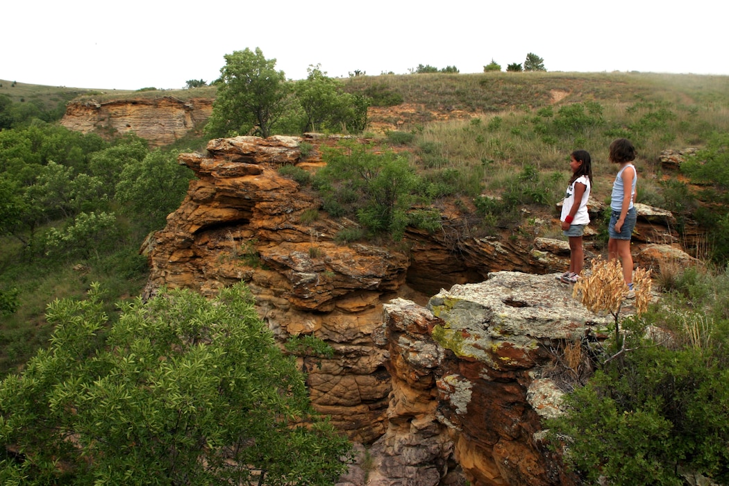 Two you girls admire the view along Horsethief Trail at Kanopolis Lake.