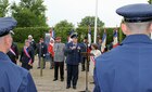 Brig. Gen. John D. Slocum speaks at a ceremony in Foucarville, France