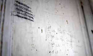 Names of American pilots on the walls of the Franquetot Castle in Coigny, France