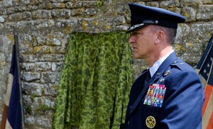 U.S. Air Force Brig. Gen. Patrick X. Mordente at a memorial in Coigny, France