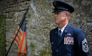 U.S. Air Force Chief MSgt. Frank Batten III at a memorial in Coigny, France
