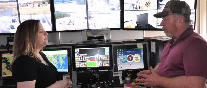 IMAGE: DAHLGREN, Va. (March 4, 2019) - Jennifer Ferrell - administrative lead for the Test and Evaluation Division at Naval Surface Warfare Center Dahlgren Division (NSWCDD) - listens intently as Donnie Preston, NSWCDD Potomac River Test Range (PRTR) Operations Center senior technician, briefs her on range operations. Ferrell is responsible for financial and human resources actions and financial management of the division, including PRTR. "The faster we can get funds properly in place, the faster we can execute the technical work to get the products delivered to the warfighter," said Ferrell. "I find pride in knowing that even though my role is non-technical, I can still make an impact to our warfighters by promoting more efficient financial and human resources policies and processes."