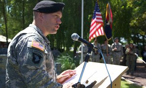 Lt. Col. Kurt Thompson of the 101st Airborne Division, speaks at a ceremony in Chef-du-Pont, France