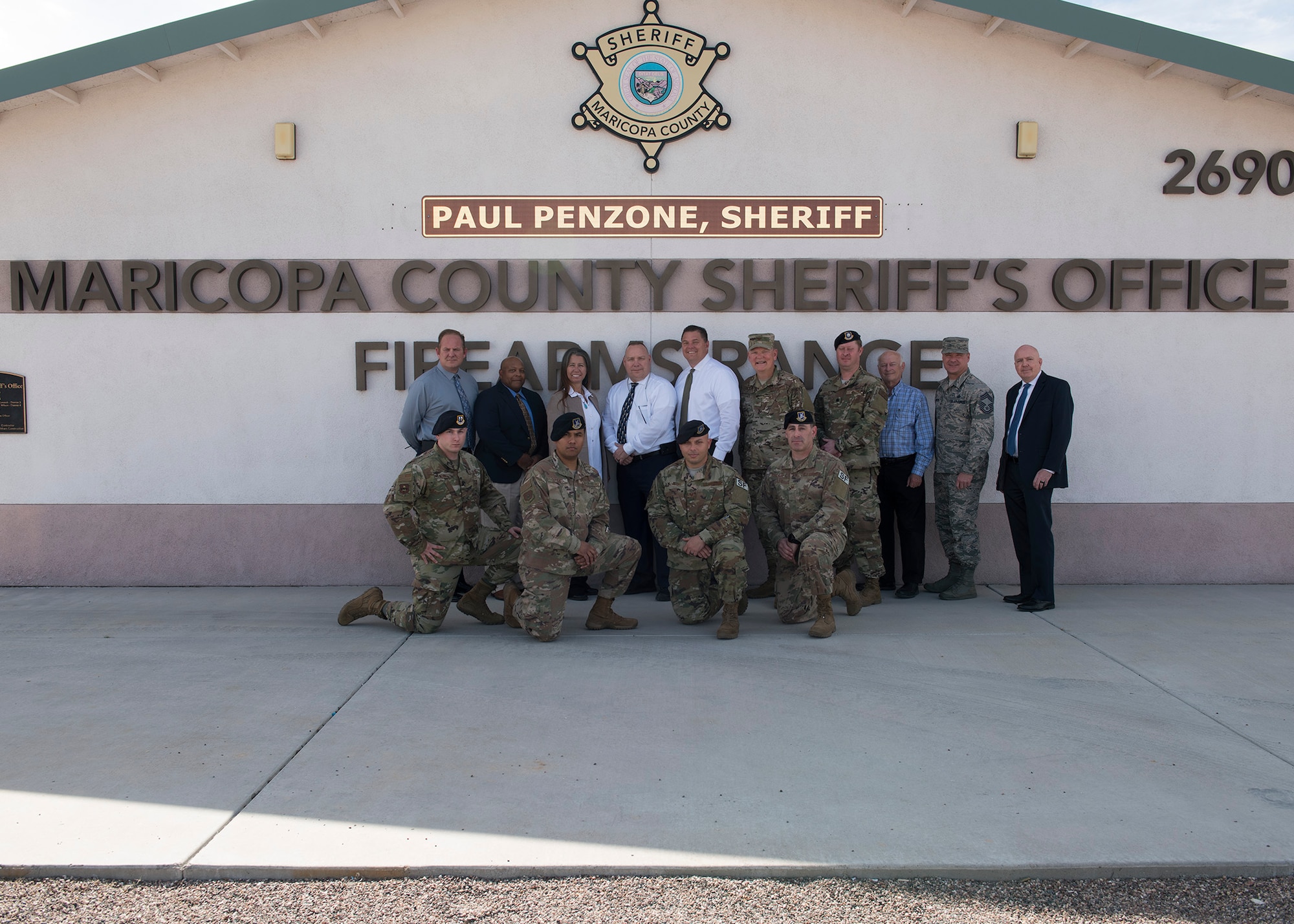 Luke Air Force Base and Maricopa County Sheriff’s Office personnel pose at the Maricopa County Sheriff’s Office Firing Range in Buckeye, Ariz., Feb. 25, 2019.