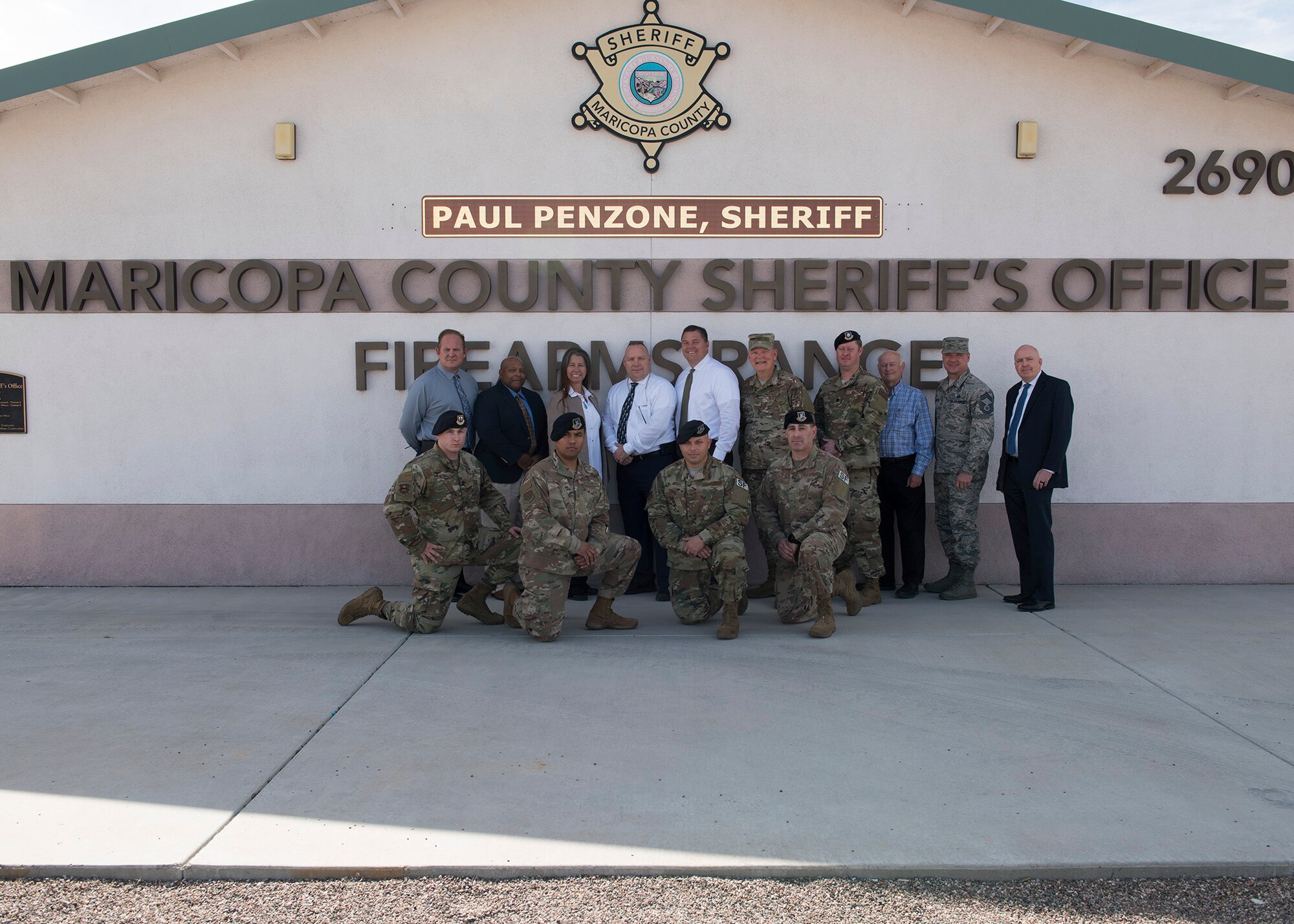 Luke Air Force Base and Maricopa County Sheriff’s Office personnel pose at the Maricopa County Sheriff’s Office Firing Range in Buckeye, Ariz., Feb. 25, 2019.