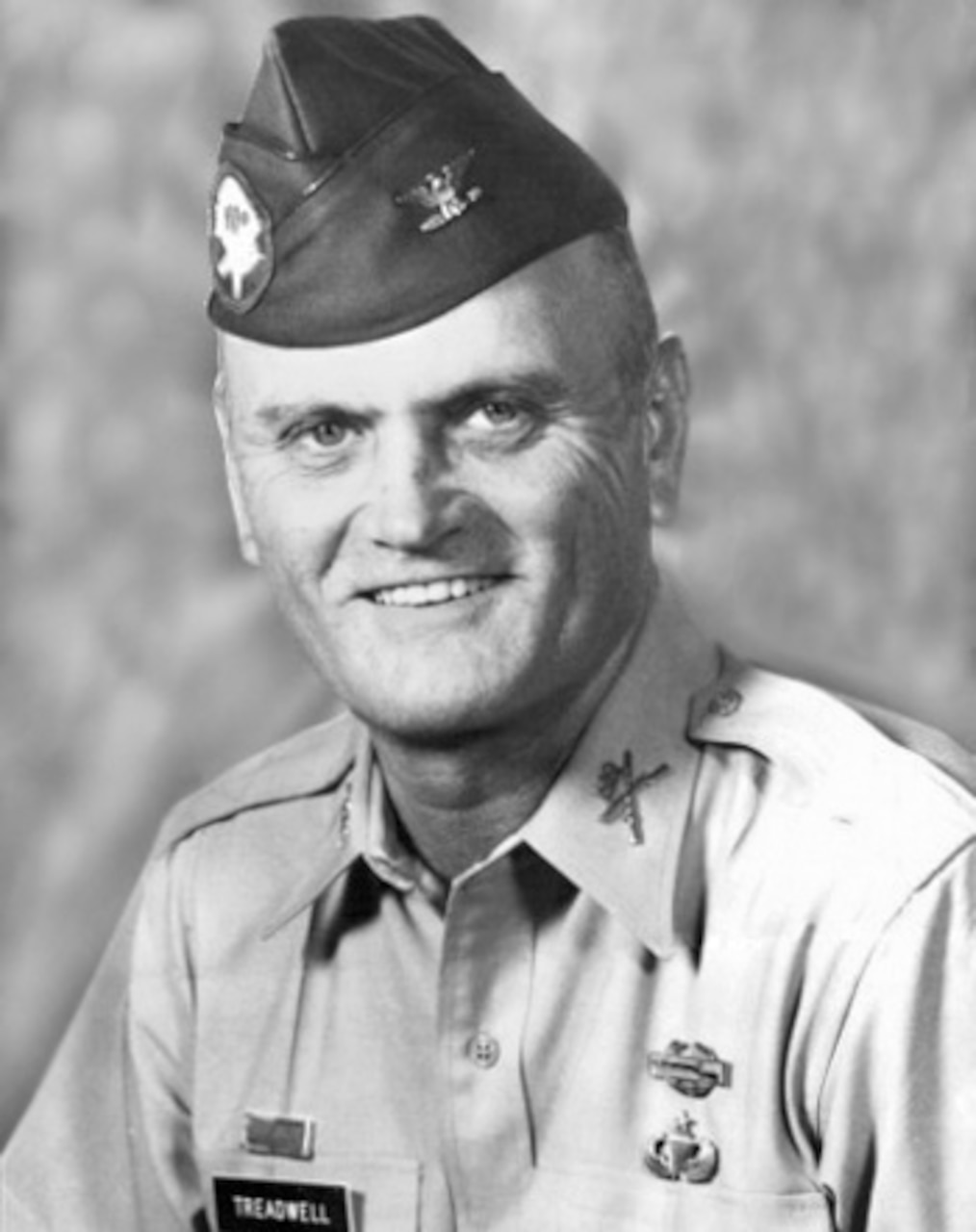 Official photo of a man in his Army dress uniform.