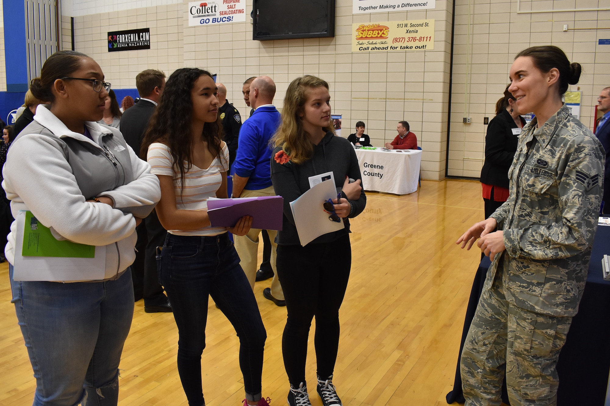 655th Intelligence, Surveillance, and Reconnaissance Wing, 71st Intelligence Squadron analyst Senior Airman Newman speaks with senior class students at Xenia High School, Xenia, Ohio, during a career fair held at the school March 13, 2019.  Newsome joined other members of the 71st and 14th Intelligence Squadrons in promoting the 655th mission as well as the opportunities and benefits available in the United States Air Force Reserve. The event was sponsored by the Ohio Means Jobs Greene County office.