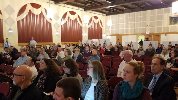 Residents gather to watch a presentation about the New York New Jersey Harbors and Tributaries Study