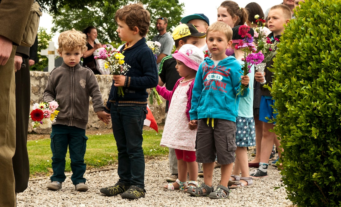 French School children at a ceremony in Graignes, France