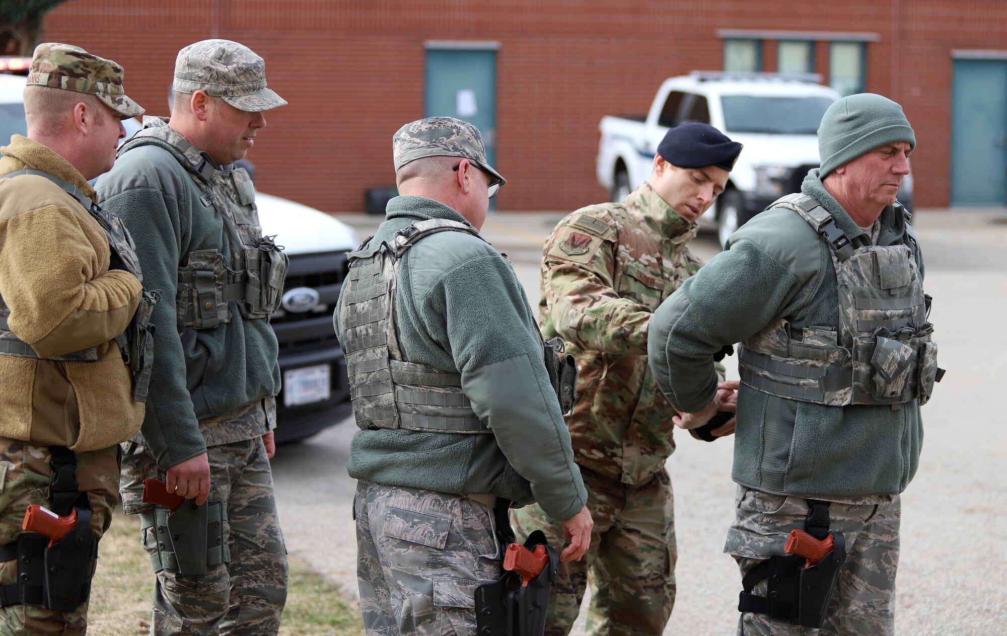 photo of Security Forces Airmen providing augmentee training