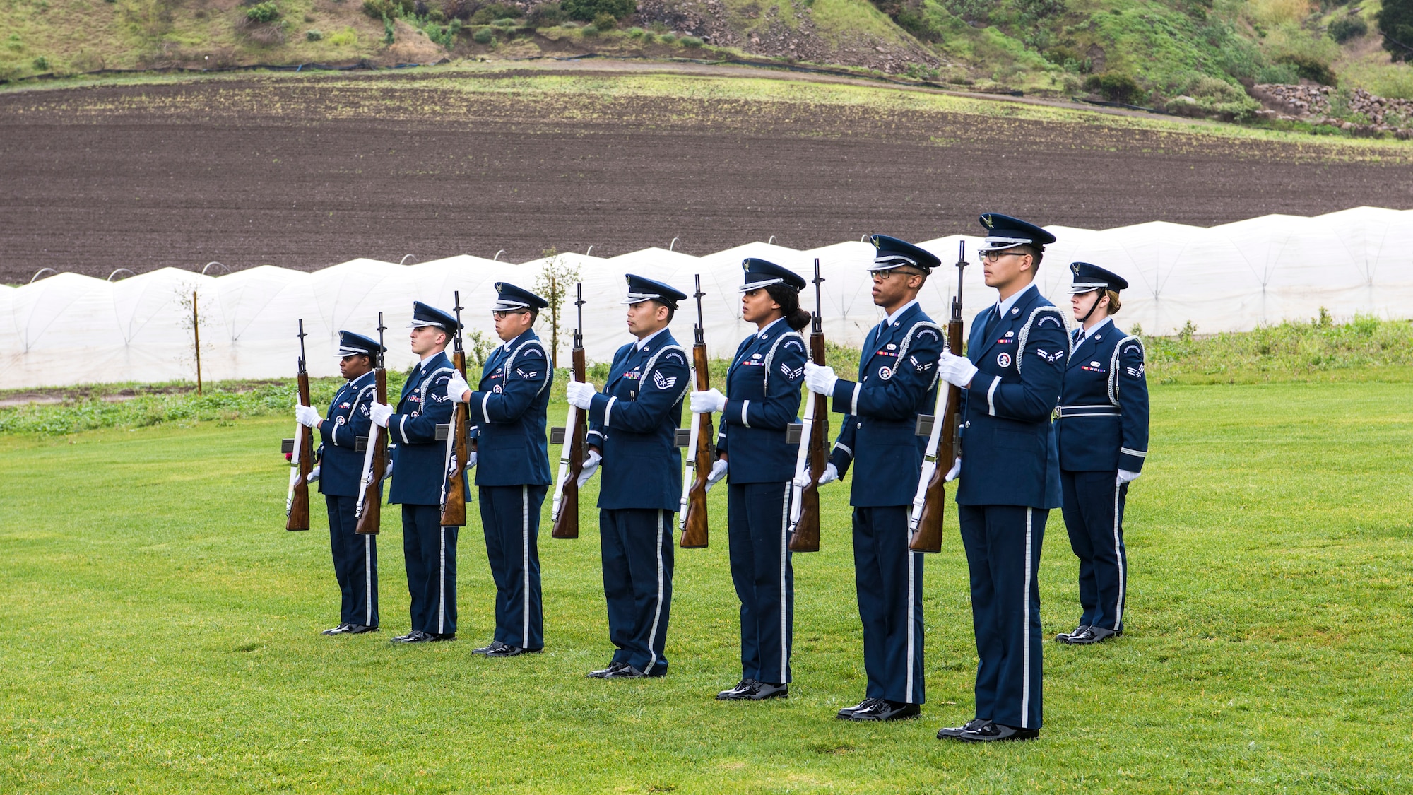 A Vandenberg Honor Guard riffle team fires three volleys during the U.S. Air Force active duty funeral March 2, 2019, in Camarillo, Calif. It is a military tradition to fire three volleys, where each riflemen fires blank cartridges into the air three times, to honor the deceased veteran. (U.S. Air Force photo by Airman 1st Class Aubree Milks)